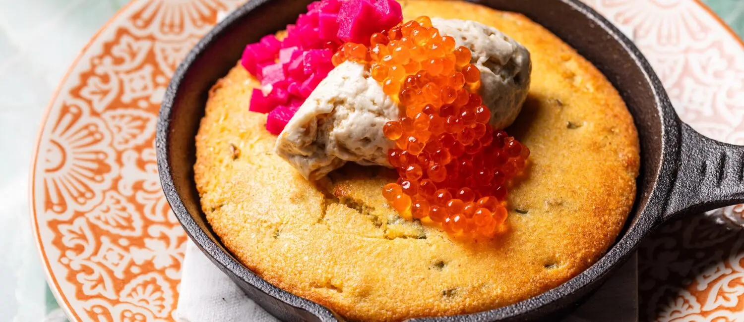 Cast Iron Cornbread with Steen’s Cultured Butter, Radish, Pickled Turnip and Smoked Trout Roe at Good God, Nadine’s