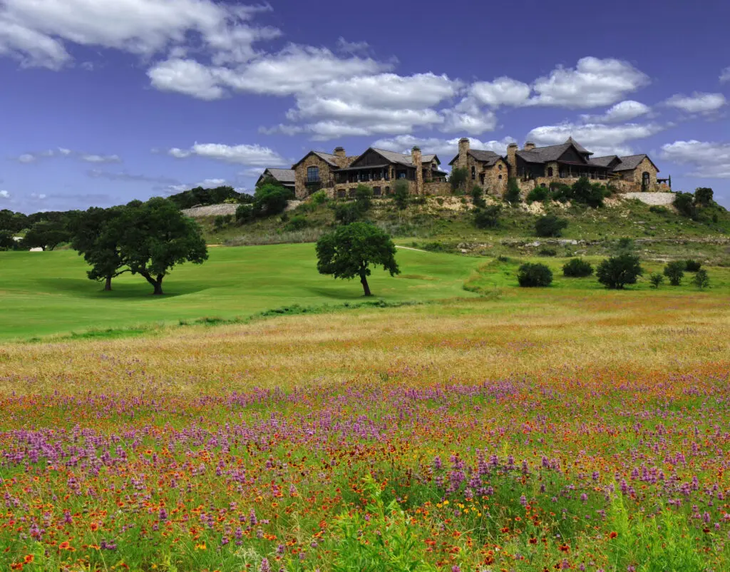 Within the majestic 55,000 square-foot Clubhouse Village, members enjoy fine and casual dining, social events, spa treatment rooms, well-appointed locker rooms, and the Golf Shop. (Photo courtesy of Boot Ranch)