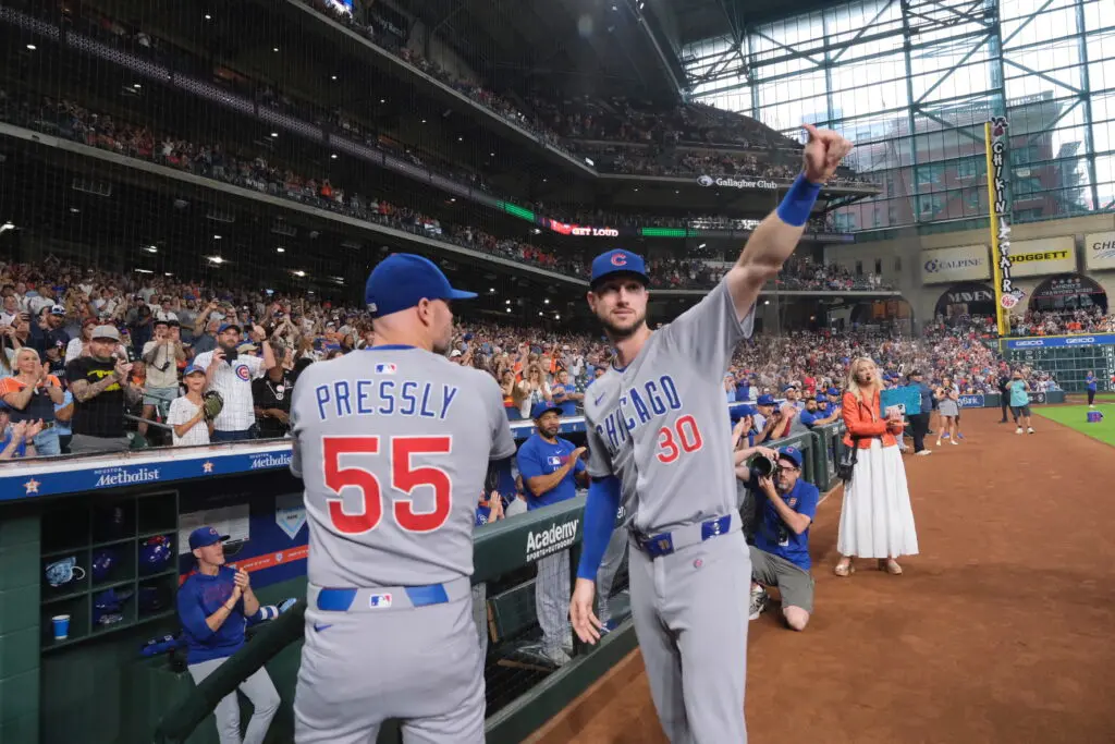 Kyle Tucker acknowledges the standing ovation Houston Astros give him on Ryan Pressly and his return to Houston. (Photo by F. Carter Smith)
