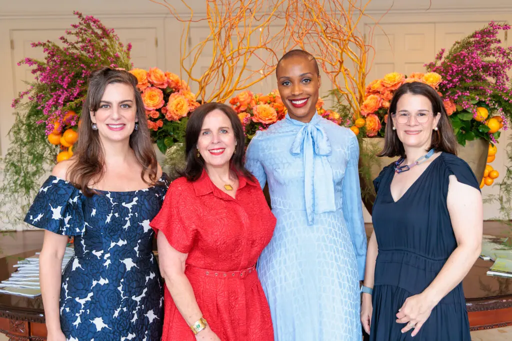 Houston Center for Contemporary Craft executive director Leila Cartier, co-chair trio Mariela Poleo, Alecia Harris, Laura Babka with John Friedman Flowers' spectacular arrangement (Photo by Katy Anderson)