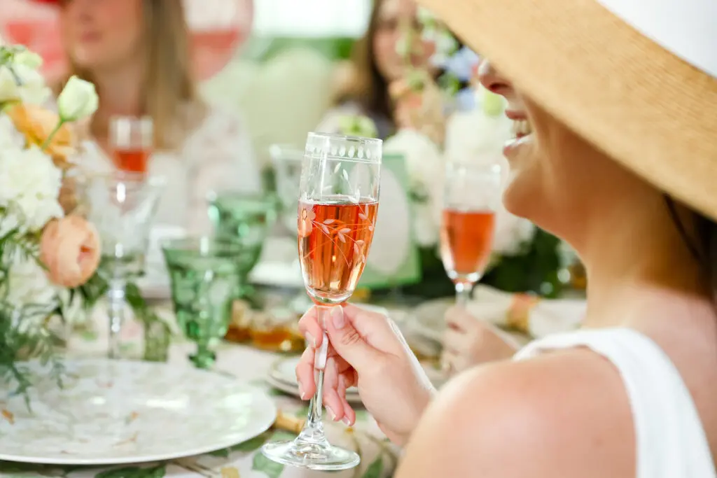 Toasts with Ruinart Rosé Champagne (Photo by Priscilla Dickson)