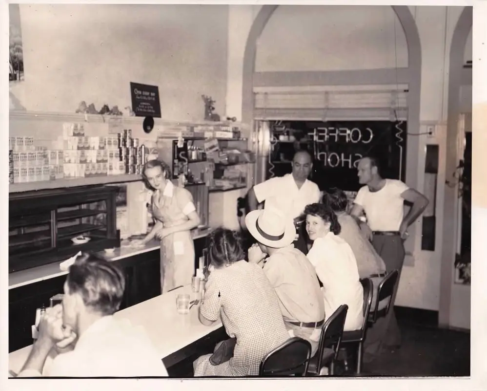 An early photo of the coffee counter at Paris Coffee Shop captures the diner’s timeless charm and decades-long connection to Fort Worth mornings. (Courtesy)