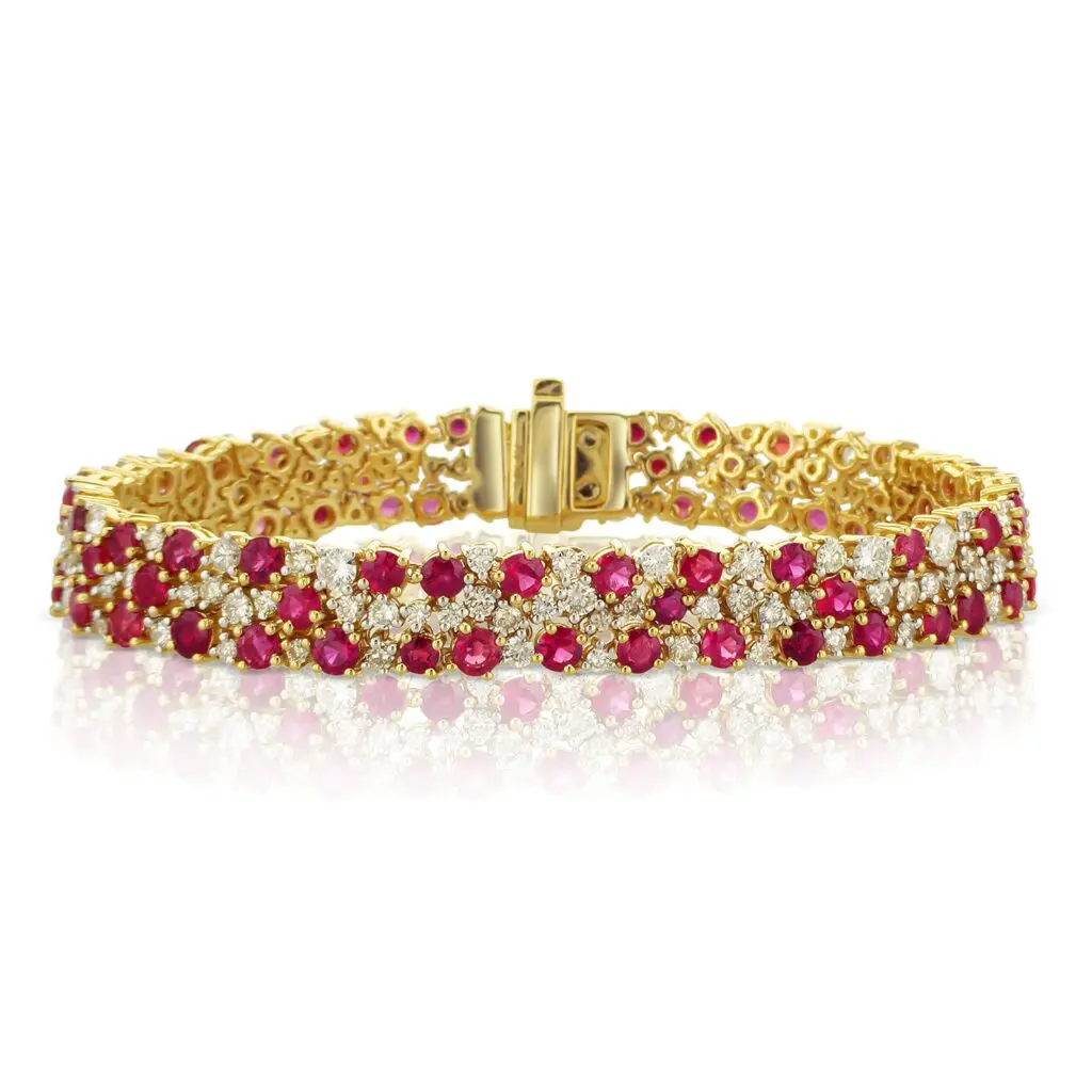 10.33 Carat Ruby & 4.27 Carat Natural Diamond Carpet Bracelet in 14K Yellow Gold, $15,175. 