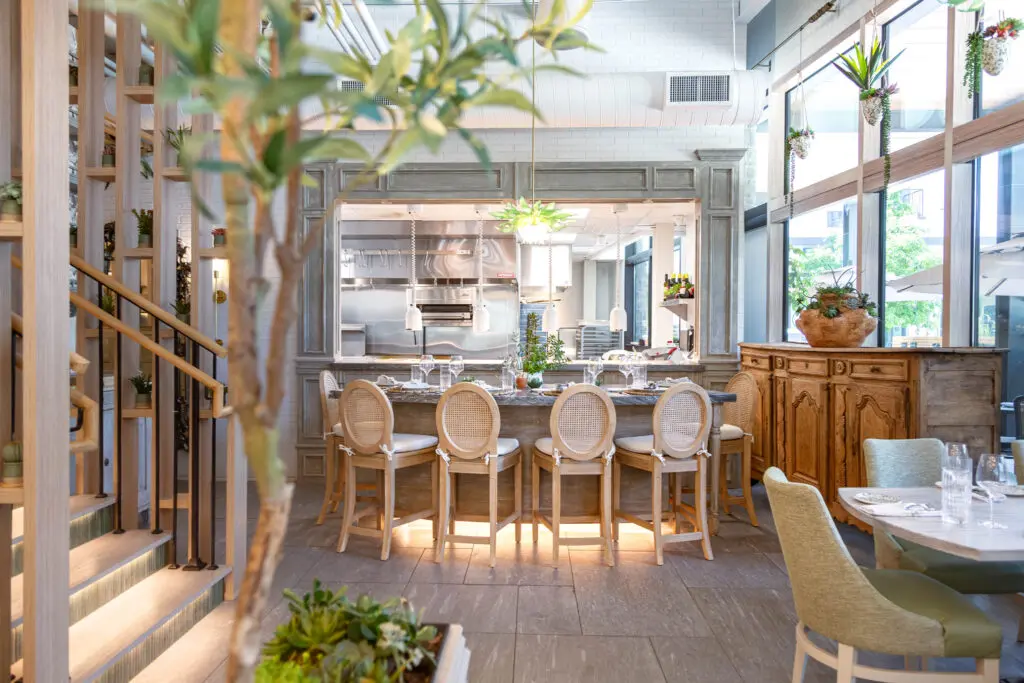 A four-seat chef’s table adjoins the semi-open kitchen at Succulent, where diners can reserve a seat and experience an omakase menu of sorts. (Photo by Jenn Duncan)