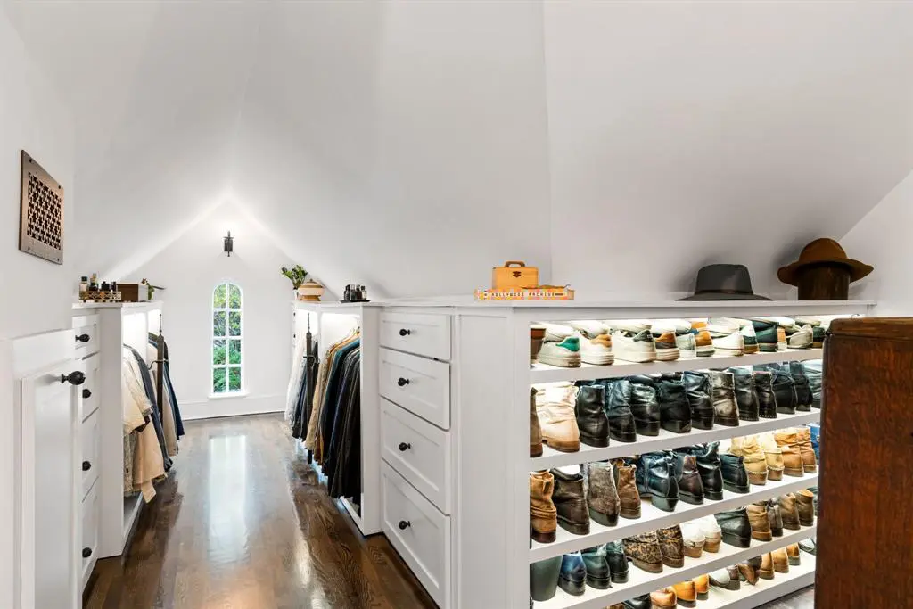 Based on the abundance of Chelsea boots in the walk-in closet, I surmise that a hip bachelor calls 1520 Olympia Drive home. (Photo by Allie Beth Allman & Associates)