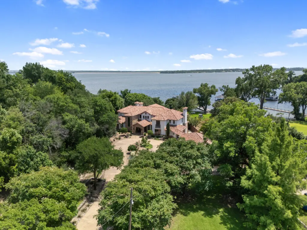 Set on 5.5 acres with direct lake frontage, 9930 Boat Club Road offers rare privacy and easy access to the Fort Worth Boat Club. (Photo by The Ashton Agency)