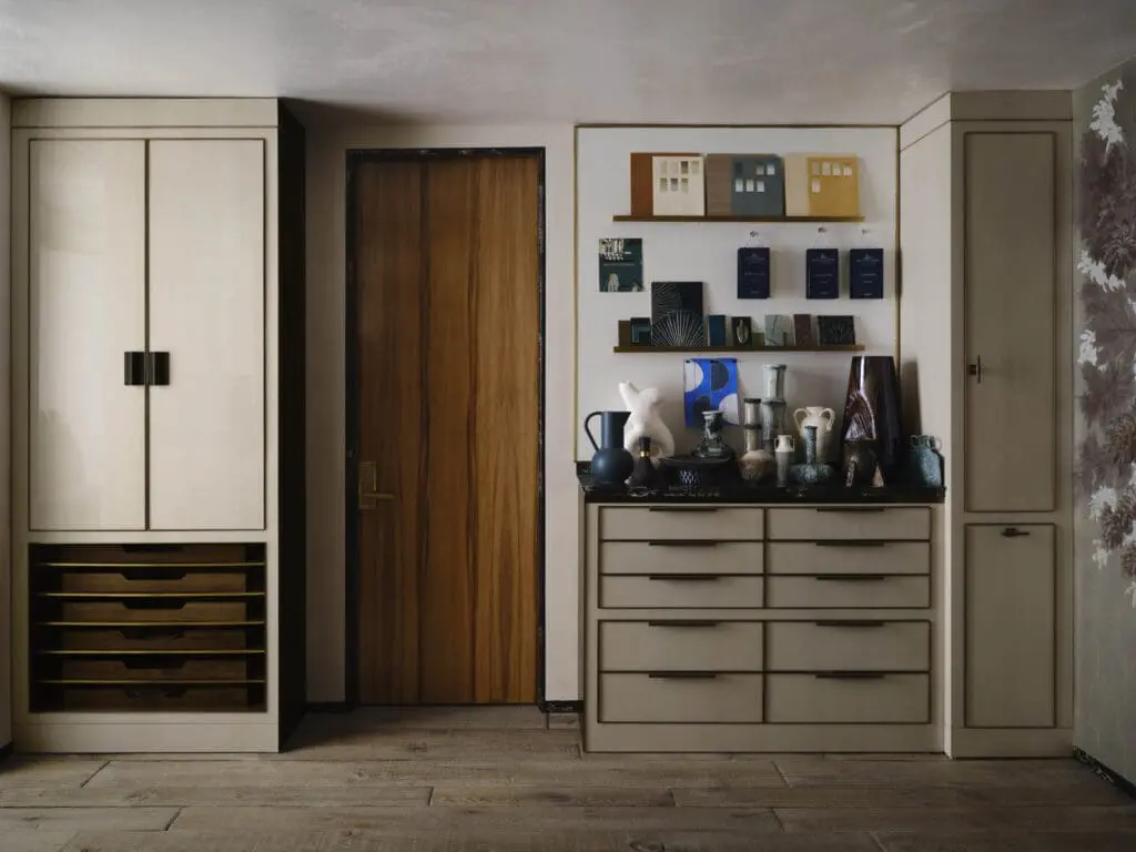Architectural details and cabinets by Doniphan Moore show the studio's custom design skills and materials. A collection of vases from Russell Brightwell and MOUS. Nance hardware, custom gumwood door. (Photo by Douglas Friedman)