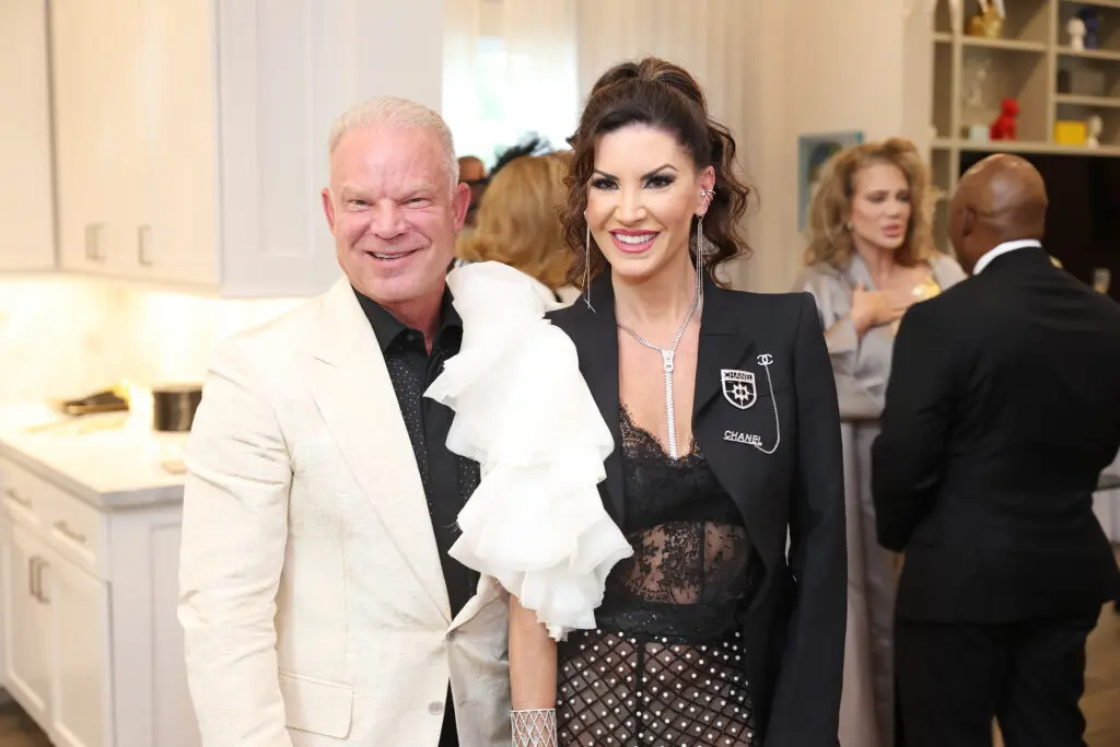 James & Niki Lassiter at the Matt Burrus & Michael Pearce surprise wedding. (Photo by Quy Trand Photography)