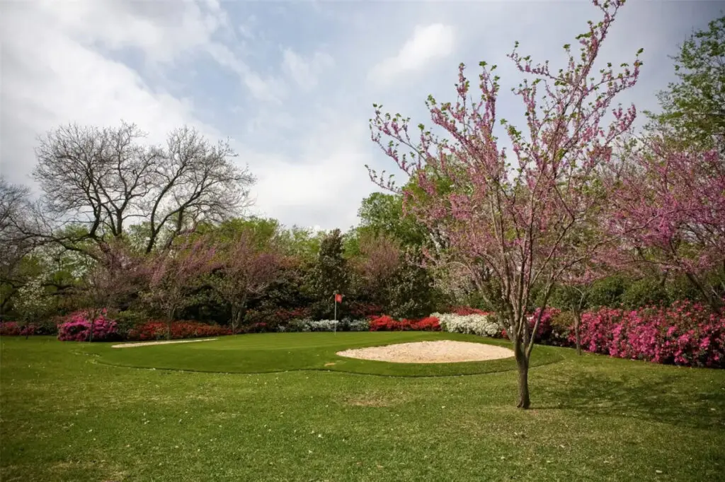 Mount Vernon is built to entertain, with tennis courts, a heated pool, and a putting green, in addition to the outdoor grill with two fireplaces and a pizza oven. (Photo by Allie Beth Allman & Associates)