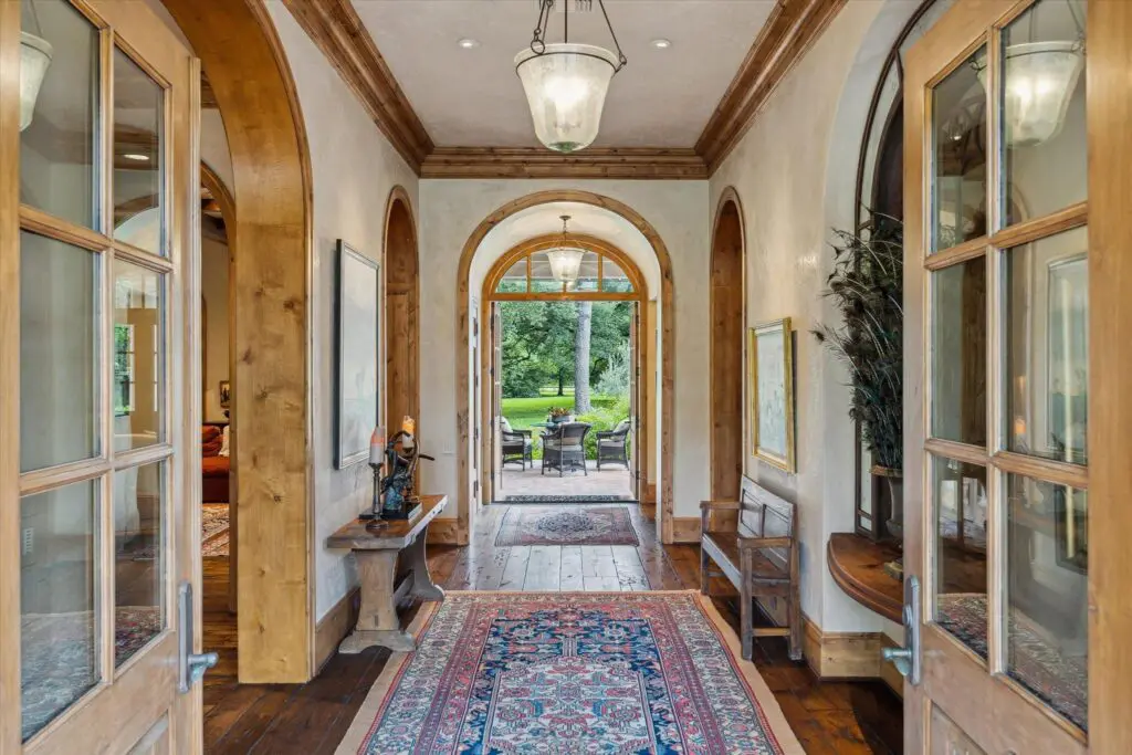 French doors open to the veranda at 3 E Rivercrest Drive.