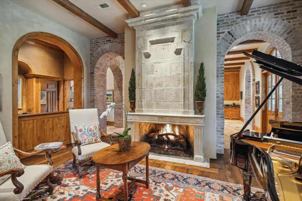 18th Century French, limestone fireplace at 3 E Rivercrest Drive.