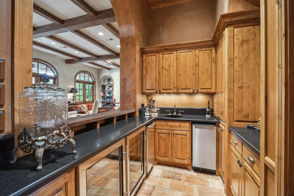 The paneled wet bar at 3 E Rivercrest Drive