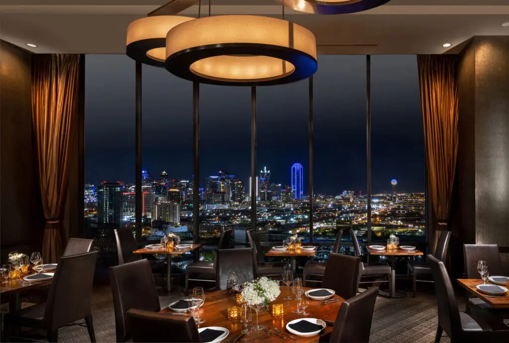 SER Steak + Spirits is on the 27th floor of the Hilton Anatole, offering stellar views of downtown Dallas. (Courtesy)
