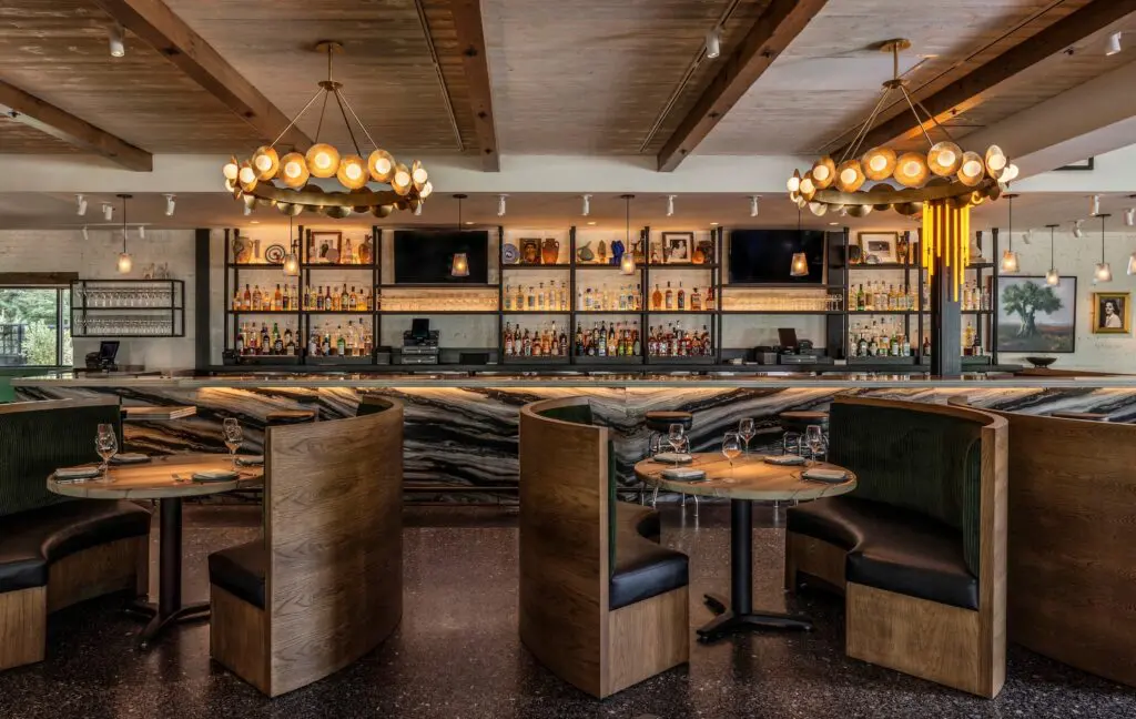 The bar and demilune booths at  Yiayia's Greek Kitchen (Photo by Claudia Casbarian)