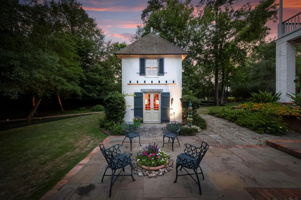 This charming custom playhouse is a backyard dream. 