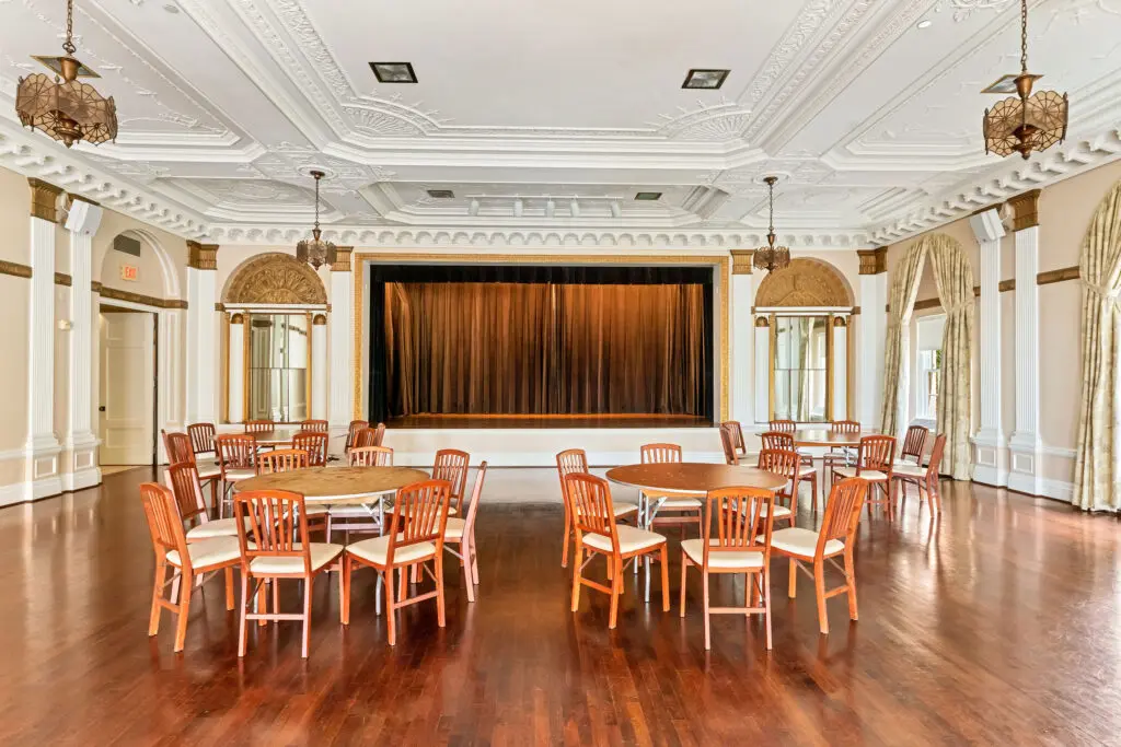 The ornate second-floor theater, part of the building’s 1928 design, will be modernized with new technology for events. (Courtesy LanCarte Commercial)