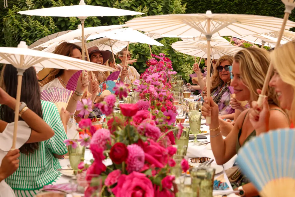 Parasols for all at the Christy Lynn luncheon held poolside at a private home in Southampton (Photo by BFA / Kevin Czopek)
