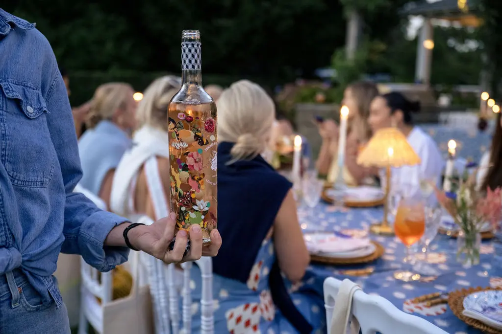 Even the wine bottles were beautifully designed for the Hunter Bell dinner party in Nantucket. (Photo by Charity Grace Photography)