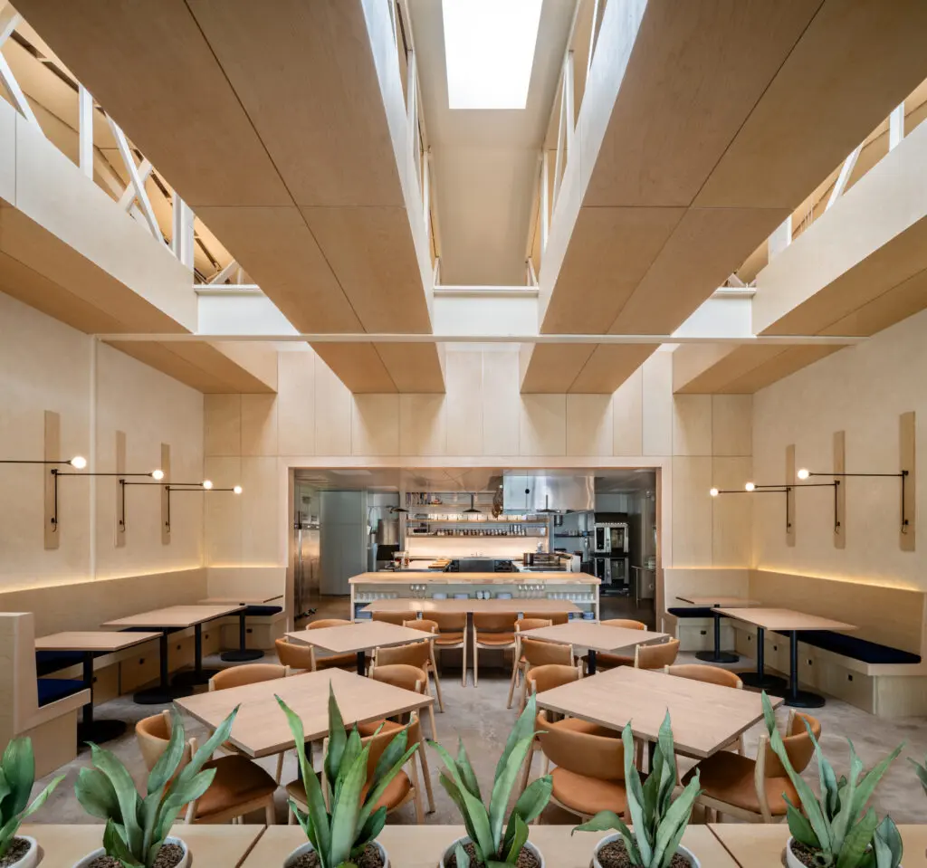 For Houston's Camaraderie restaurant, Schaum Architects transformed a former metal and woodworking workshop in the Heights — basically a wood-framed, gable-roof garage. (Photo by Leonid Furmansky) 