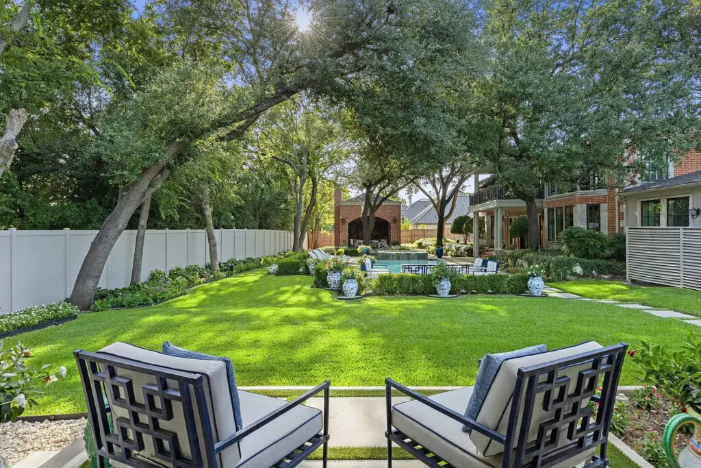 The backyard offers multiple covered terraces, a pool, a spa, jetted water features, and ample space for a sport court or putting green. (Photo by Allie Beth Allman & Associates)