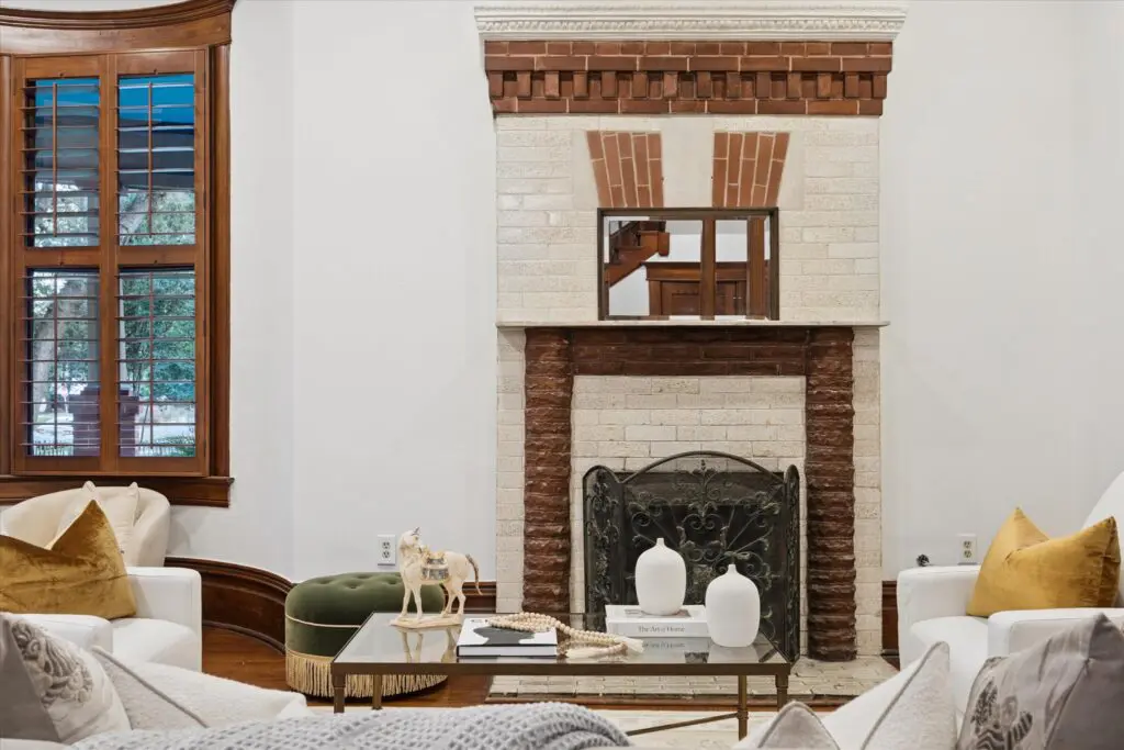 The living room fireplace at 1011 Heights Blvd. showcases the original owner's talents as a brick mason (Photo by TK Images)