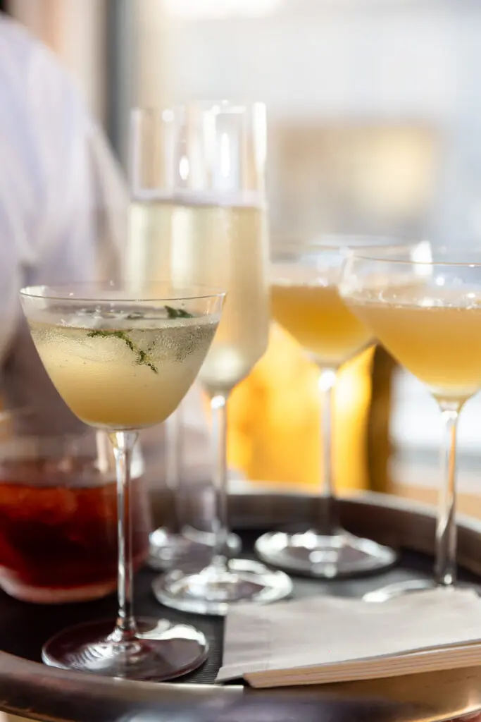 Guests sipped on speciality cocktails, including the Fizz, Honey Lemon Drop, Negroni with a Lemon Twist, and Bee's Knees. (Photo by Kaitlin Saragusa BFA)