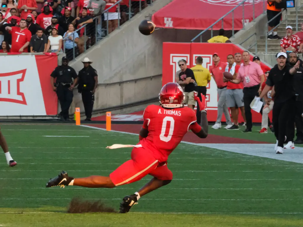 University of Houston receiver Amare Thomas makes a diving catches look routine. (Photo by F. Carter Smith)