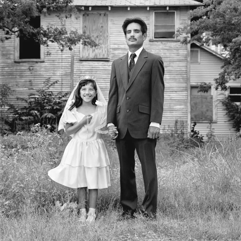 Laura Wilson's "Father and Daughter, First Communion, Dallas, Texas," 1988, at Meadows Museum, SMU (© Laura Wilson)