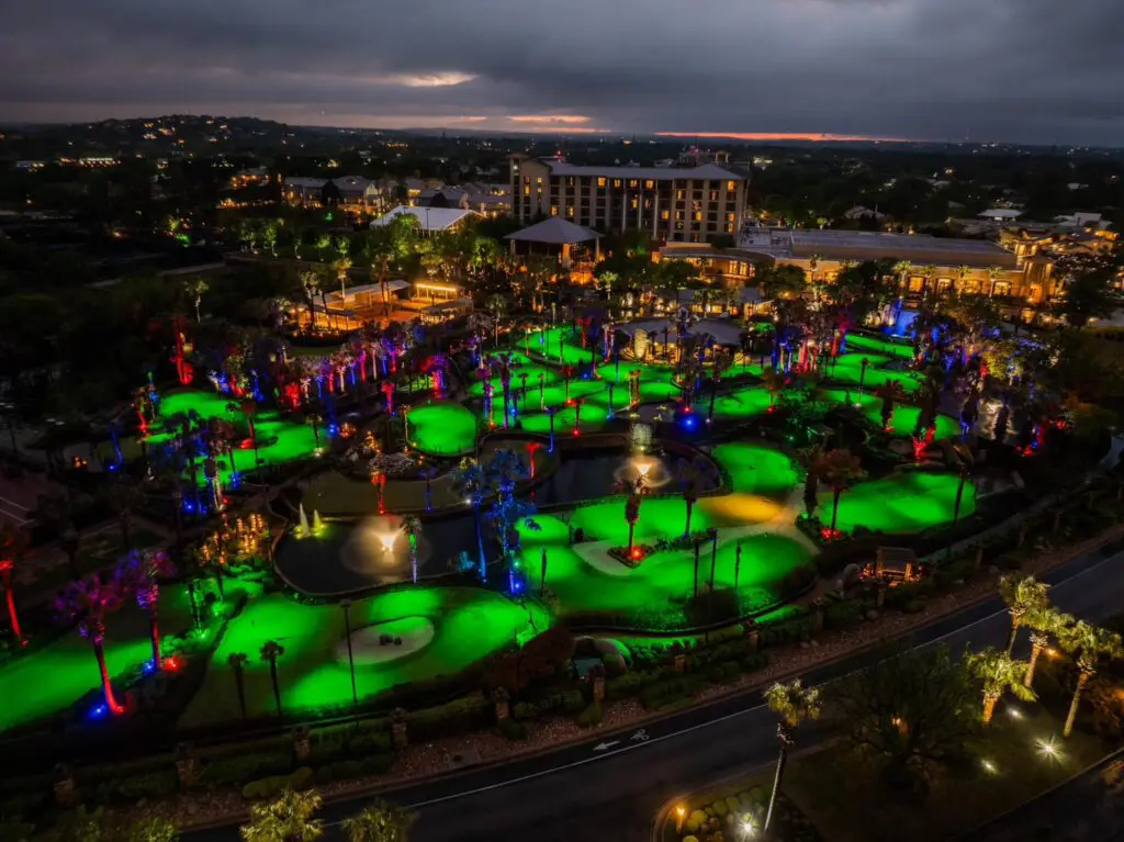 The 18-hole miniature Whitewater Golf Course was designed to replicate a competitive course and features challenging bunkers and water hazards, as well as scenic waterfalls, rose gardens, and exotic birds. (Photo by Horseshoe Bay Resort)