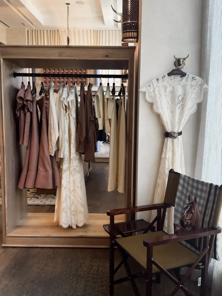 Accessories like vintage belt buckles complete outfits. (Courtesy Lela Rose)