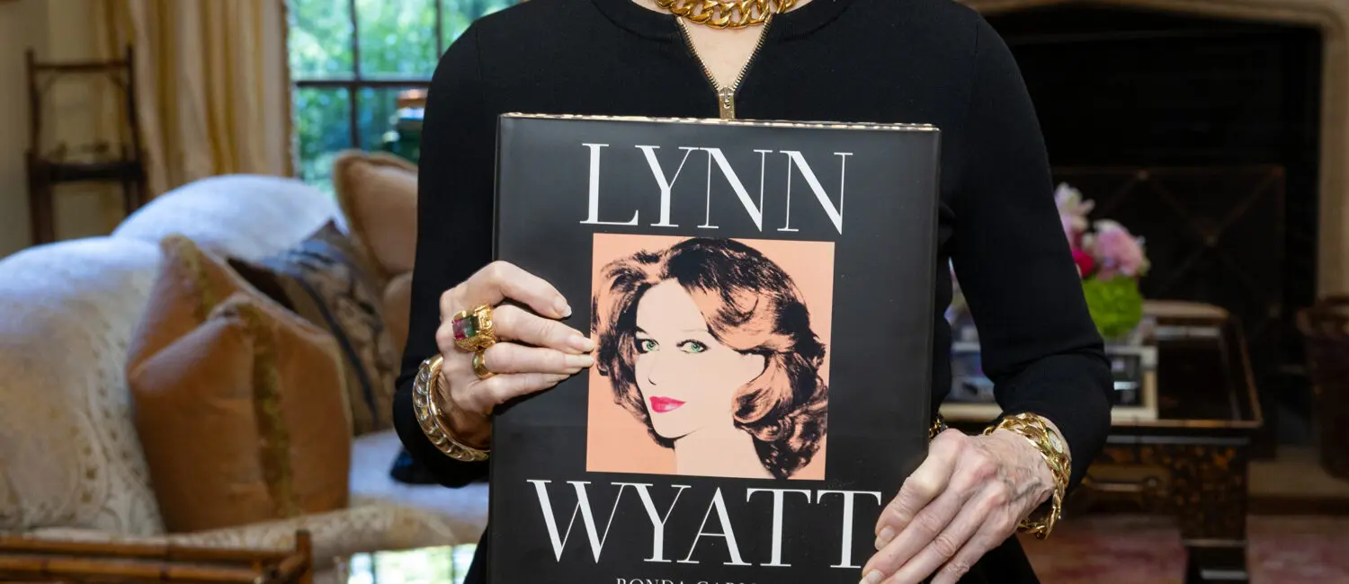 Lynn Wyatt with her book (Photo by Jenny Antill)