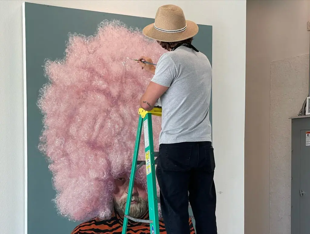 Jay Wilkinson works on a piece for the show. (Photo by Megan Caroll Henderson)