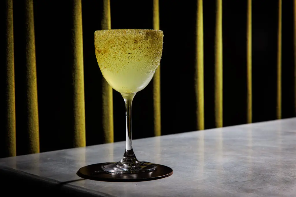 At Caché, the Maison Verte is a nice balance of tequila, chartreuse, basil eau de vie, and pineapple cordial. (Photo by Samantha Marie Photography)
