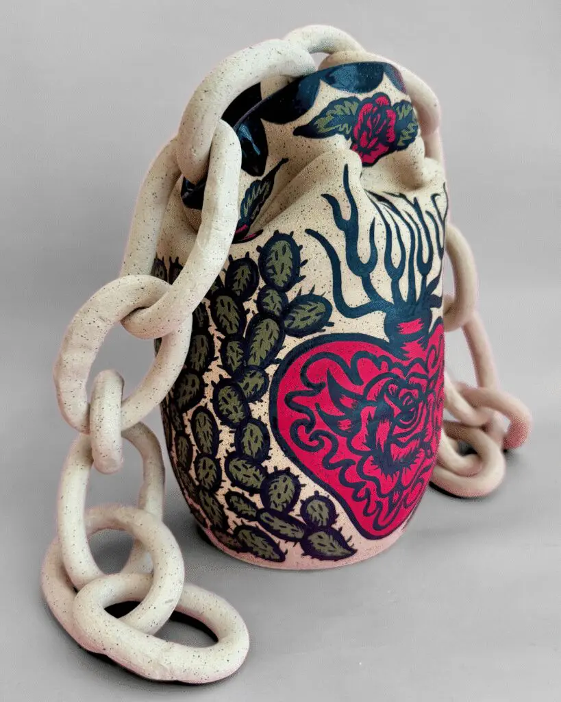 Nadia Gonzalez — A mixed-media artwork incorporating nopales imagery, where practical utility meets cultural symbolism to explore protection, resilience, and identity through a vibrant Chicana perspective. (Courtesy)