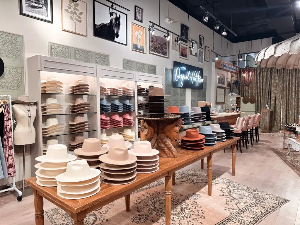 Flea Style in River Oaks Shopping Center offers scores of unisex hats awaiting the buyer's decorative inspirations.