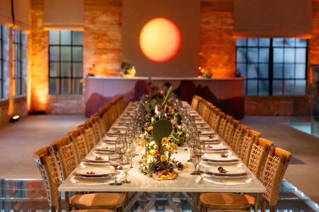 Sunsets were projected onto the walls of The Pump House, reflecting the setting of the campaign photoshoot. (Photo by Kaitlin Saragusa Photography)