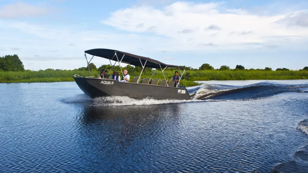 Each evening, expedition guides walk guests through the following day's options, from active bikes and hikes to leisurely tuk-tuk and skiff rides. (photo courtesy of Aqua Expeditions)