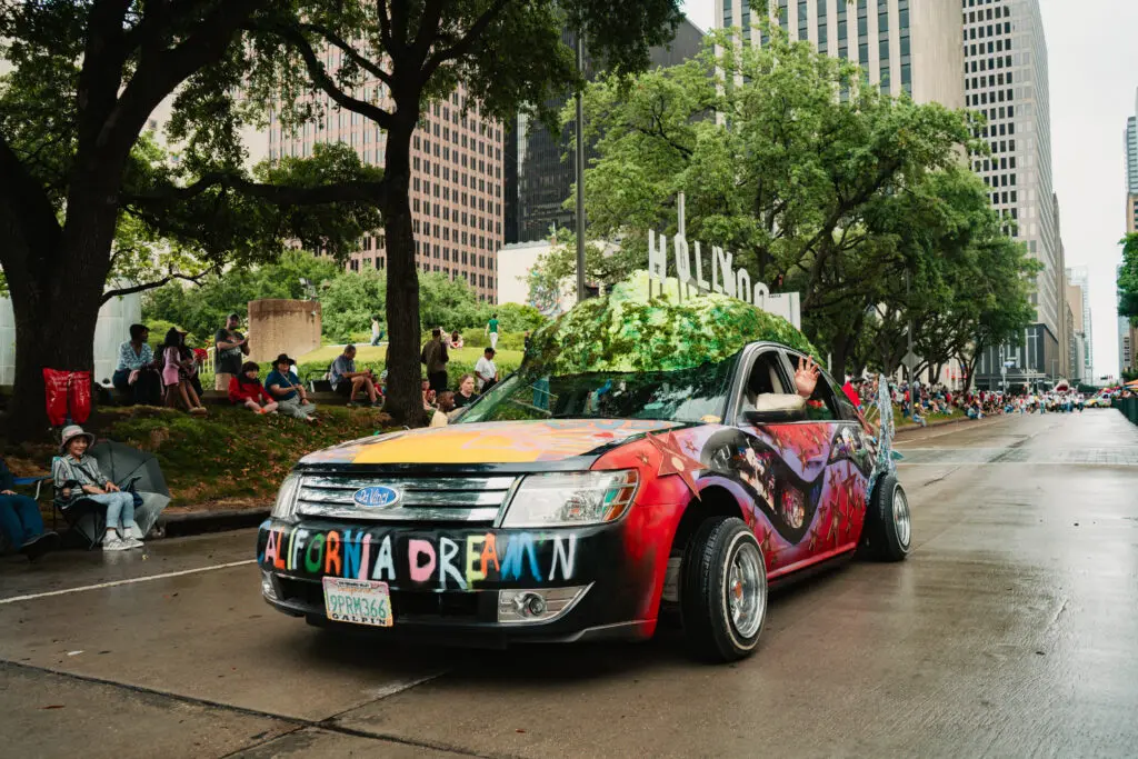 “California Dream’n” by Da Vinci Design, a high school in the Los Angeles area, won a first-place award at the Orange Show’s 39th Annual Art Car Parade. (Photo by BENSIIVE)