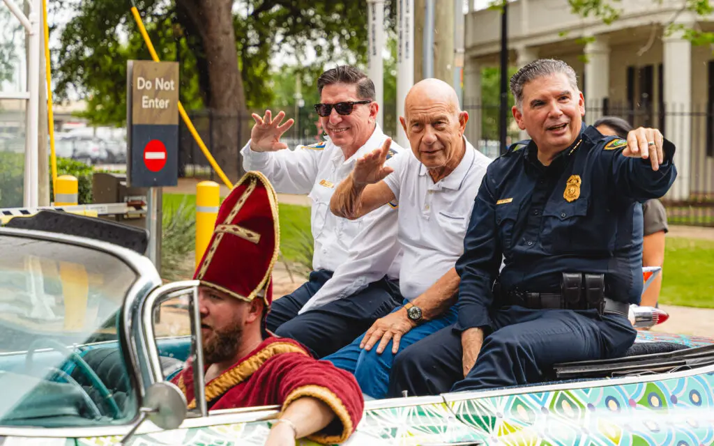 Houston Fire Department Chief Thomas Muñoz, Mayor John Whitmire and Houston Police Department Chief J. Noe Diaz all made an appearance at the Orange Show’s 39th Annual Art Car Parade. (Photo by Duc Hoang)