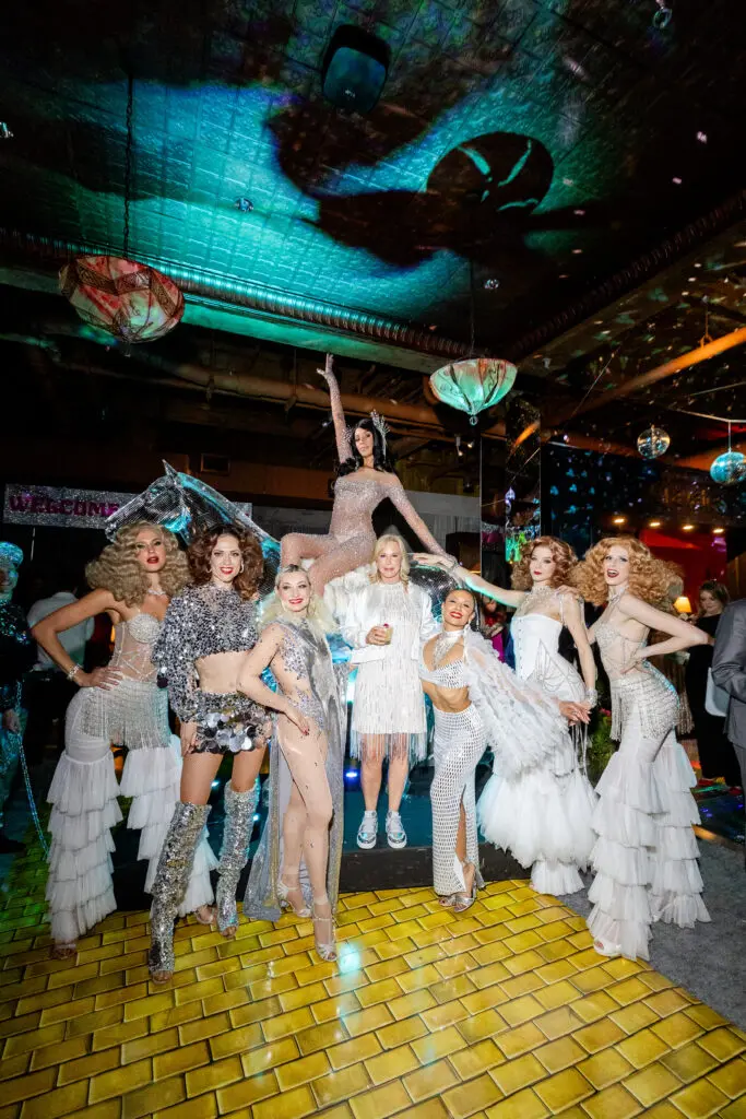 For the surprise concert and after party, Walraven changed into a custom Michael Faircloth party dress. (Photo by Anastasiia Photography)