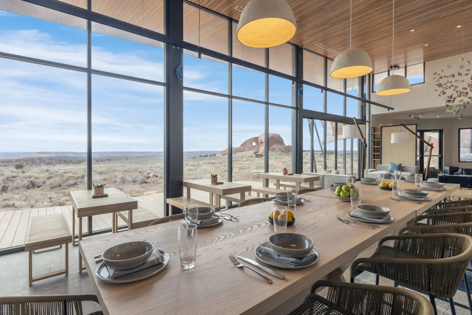 The main lobby lounge building at ULUM Moab overlooks the iconic Looking Glass Arch and the sprawling Utah desert.