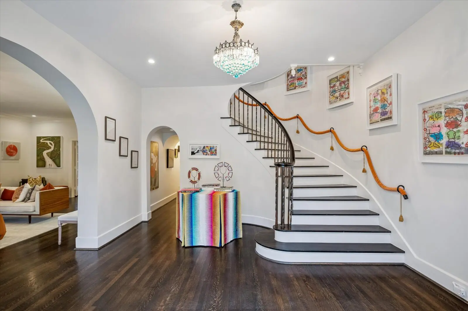 The current owners' modern art blends with the historic bones of 15 Courtlandt Place (Photo by Tk Images)