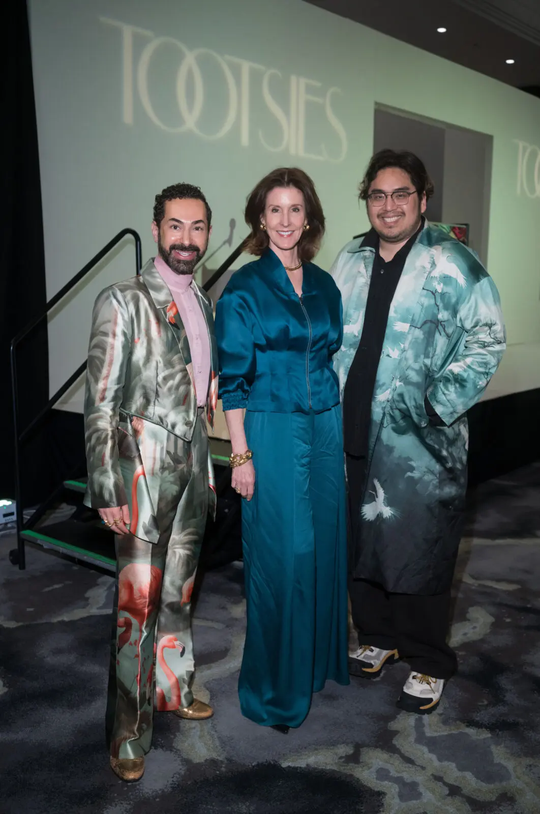 Fady Armanious, Phoebe 
Tudor, both wearing Bach Mai, the designer Bach Mai at 'Asia Society Texas’ 'Runway to Asia' luncheon (Photo by Daniel Ortiz)