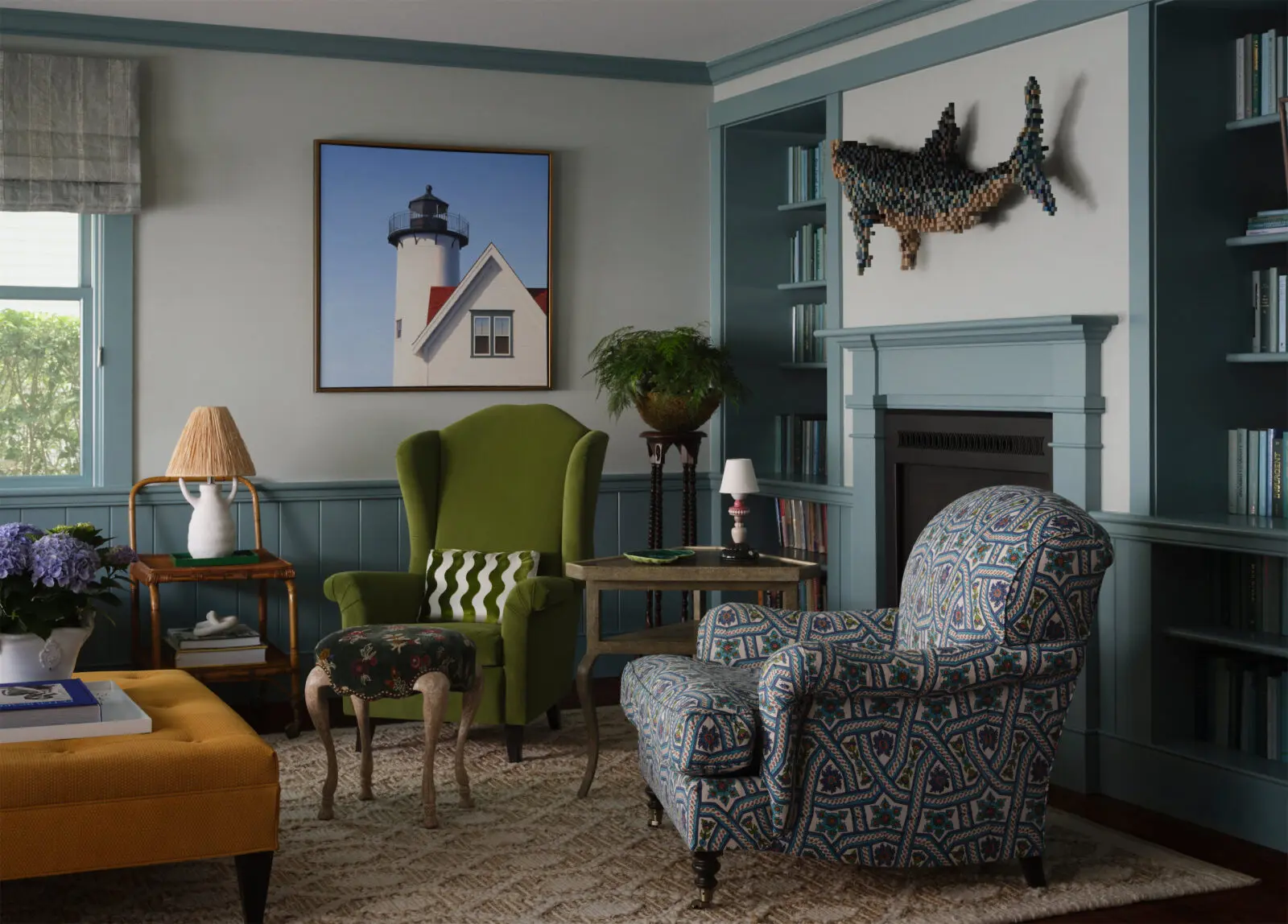 A playful wood shark from Vinya over the fireplace nods to Edgartown’s legendary Jaws history. (Photo by Douglas Friedman)