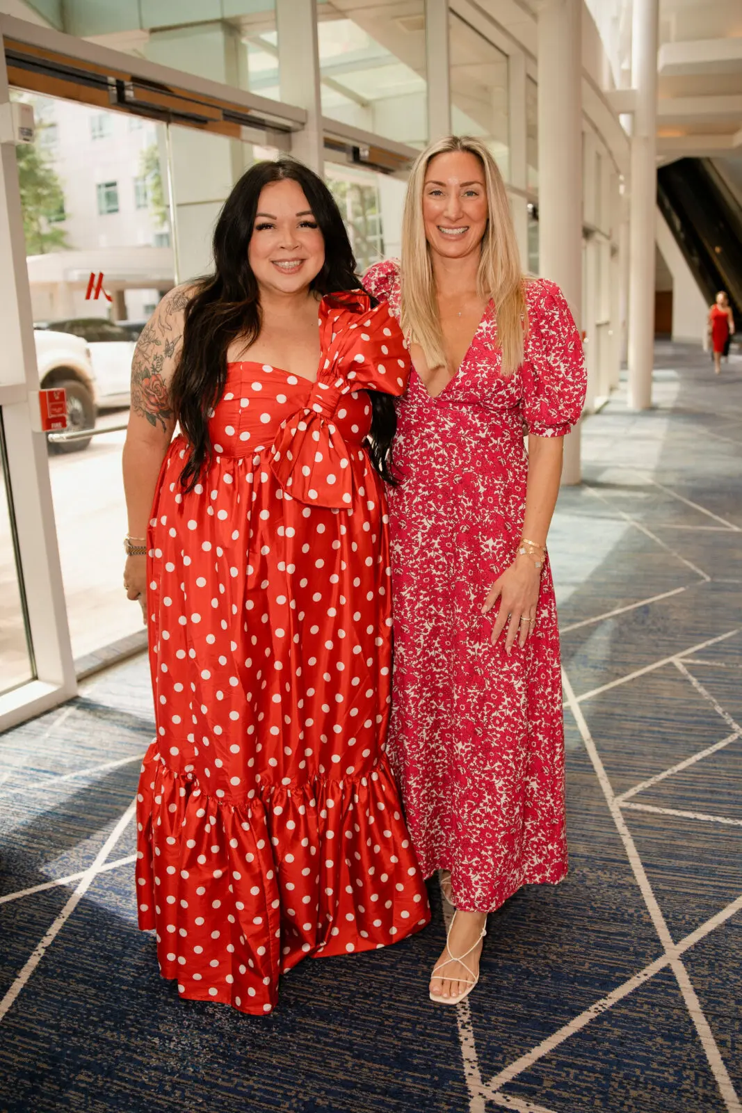 Tina Rivera and Claudine Simmons at the Go Red for Women Luncheon at The Woodlands Waterway Marriott. (Photo by 209 Photobooth)