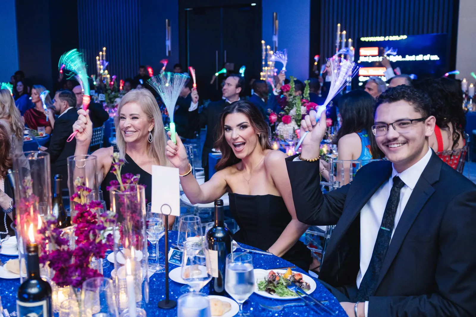 KIPP Texas Public Schools dinner guests celebrate the record $1.4 million in proceeds