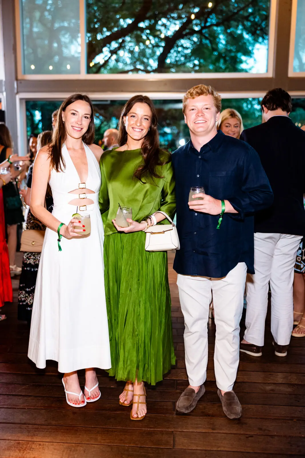 McKenzie Dietrich, Christiana Elliott, and John Thomas Hildebrand at Discovery Green's 'A Night of Discovery' (Photo by Hung L. Truong)