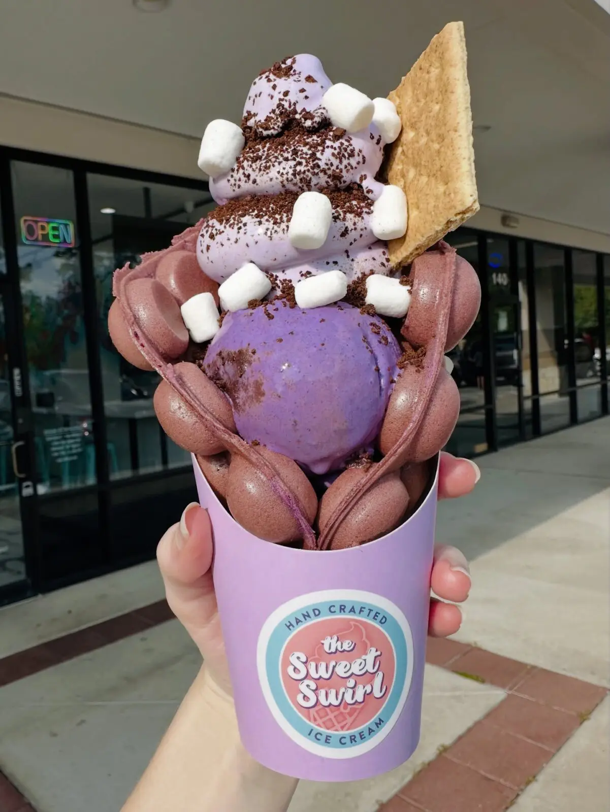 A house-made bubble waffle with ice cream from The Sweet Swirl is a summertime treat. (Photo courtesy The Sweet Swirl)