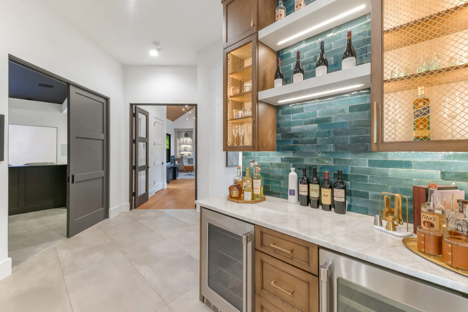The built-in bar could readily service celebrations for Cowboys' wins. (Photo by Costa Christ / Compass)