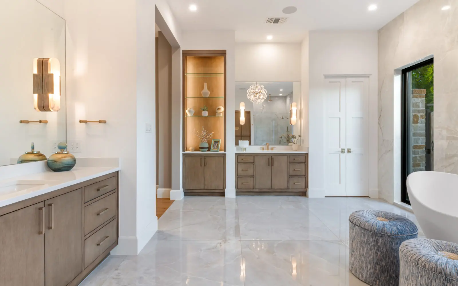In the primary suite, find a private wing with a spa-like bath. (Photo by Costa Christ / Compass)